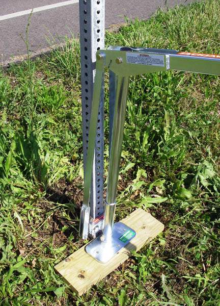 Use a wood board on soft soil